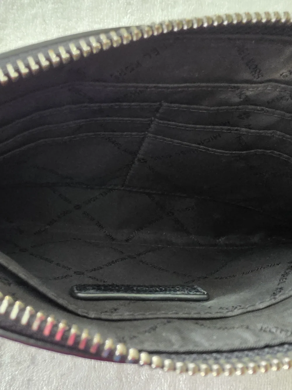 Michael Kors Silver Logo Wristlet Clutch